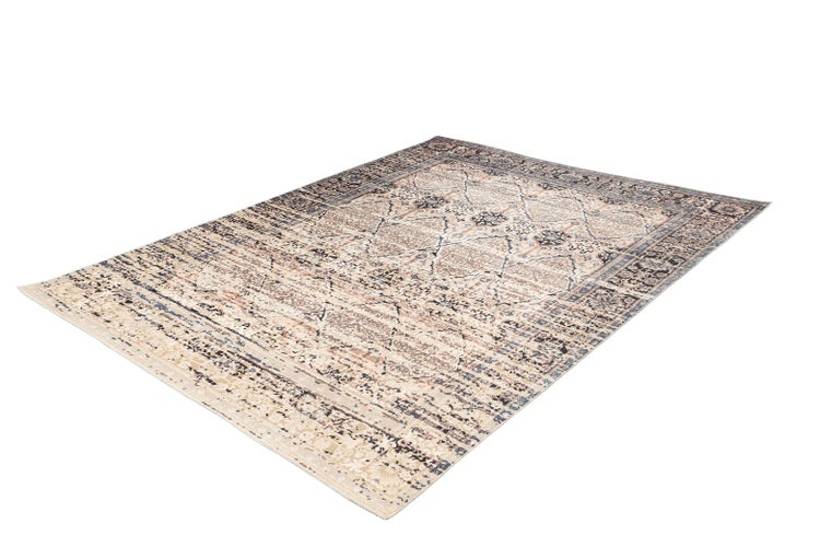 Rechteckiger Teppich mit orientalischem Muster und Vintage-Effekt.