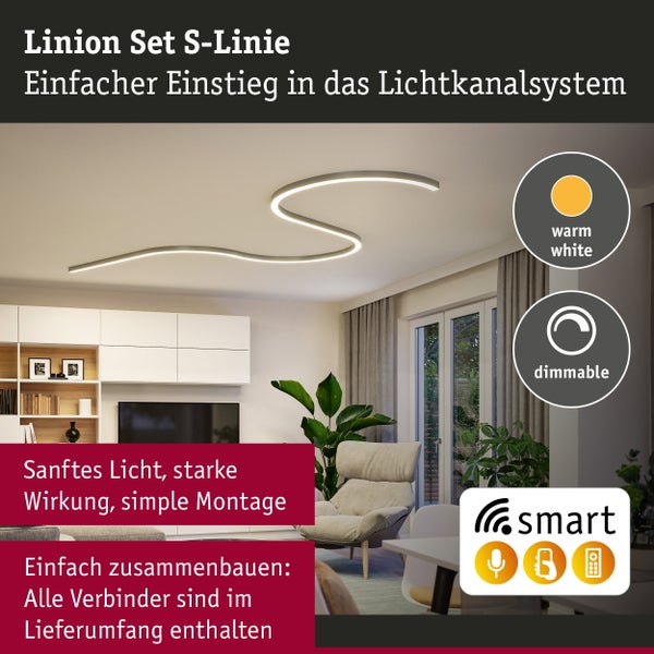 Linion Set S-Linie Beleuchtungssystem mit Power Channel, 90 Grad Kurven, Schiene und Zigbee Kompatibilität, installiert in einem Wohnzimmer.