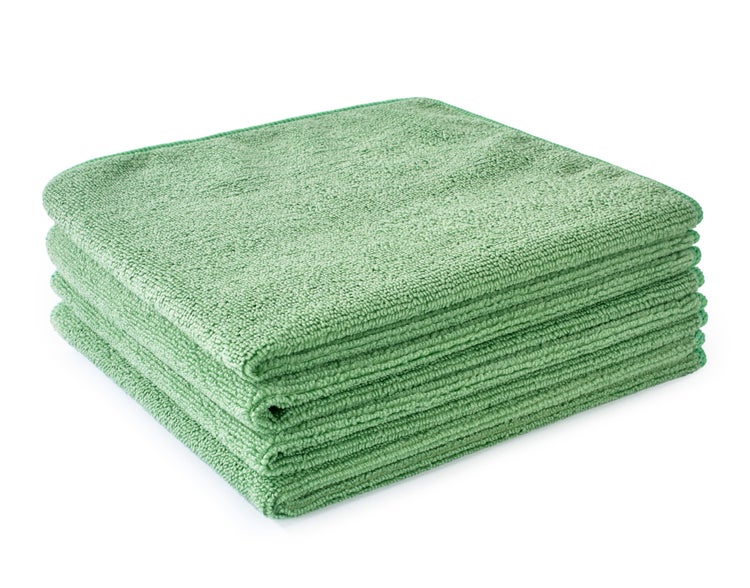 Stapel grüner Mikrofasertücher