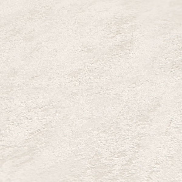 Zuschneiden einer grünen Matte mit einem Cuttermesser, mit dem Hinweis, dass die Kanten nicht ausfransen.