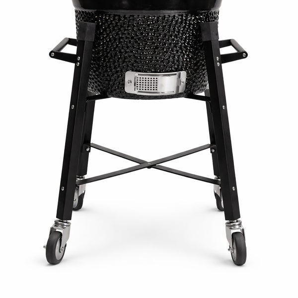 Untergestell für Kamado-Grill aus Metall mit vier Rollen und Belüftungsschieber am schwarzen Keramikkorpus.