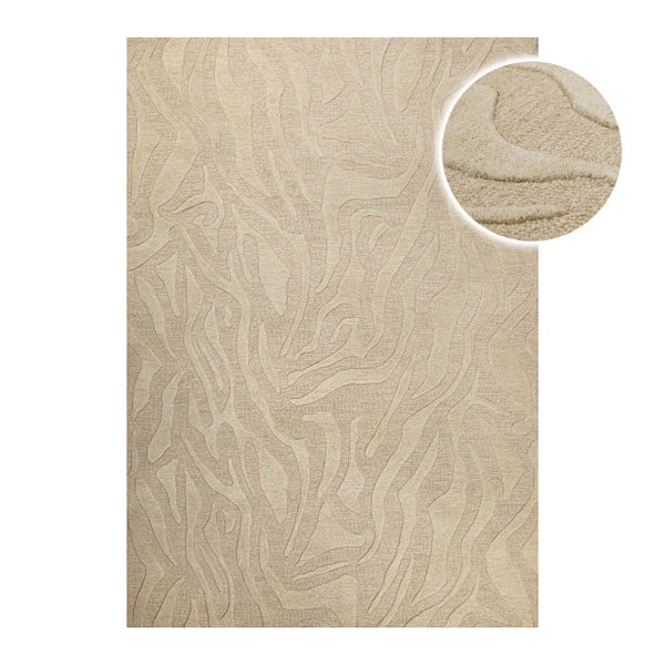 Beige, rechteckiger Teppich mit abstraktem Wellenmuster und Detailansicht der Textur.
