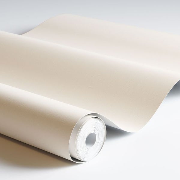 Buch mit Blattgold und Hand mit Schutzhandschuh