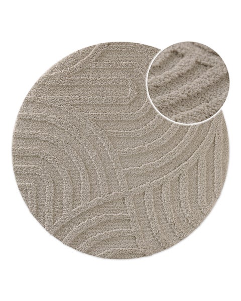 Runder beigefarbener Teppich mit Wellenmuster und Detailansicht der Oberflächenstruktur.