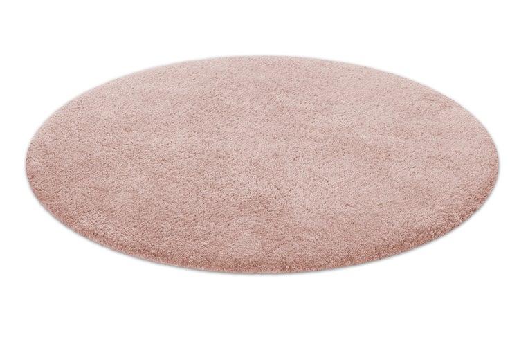 Runder, flauschiger Hochflor-Teppich in Altrosa.
