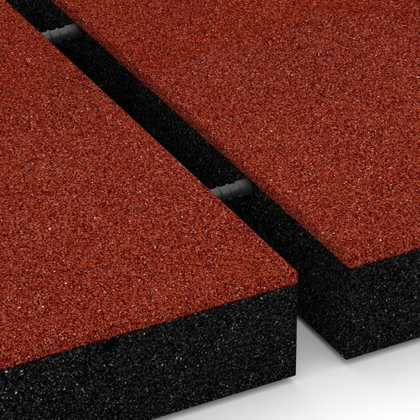 Fallschutzmatte aus Gummigranulat mit Verbindungsstiften, zweischichtiger Aufbau mit strukturierter Oberfläche.