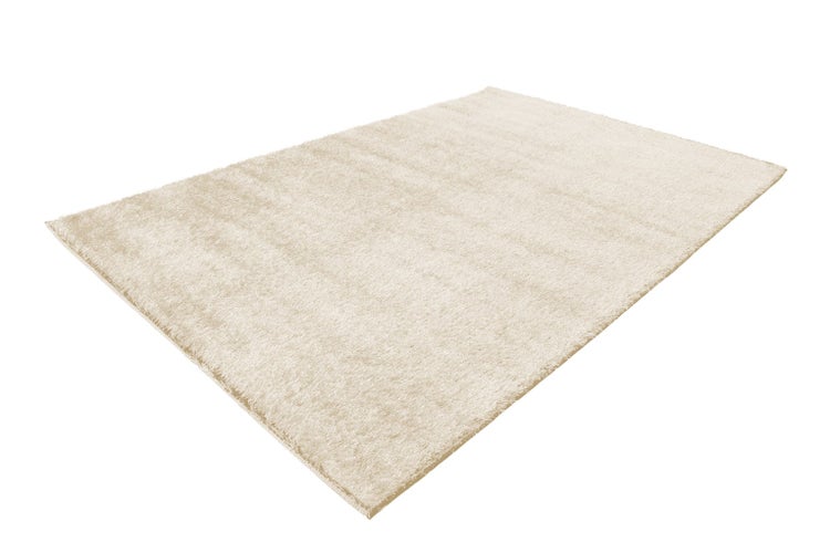 Rechteckiger Hochflor Teppich in Creme mit weicher Textur.