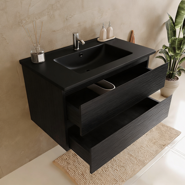 Moderner Waschtischunterschrank mit zwei offenen Schubladen und integriertem Waschbecken in einem Badezimmer.