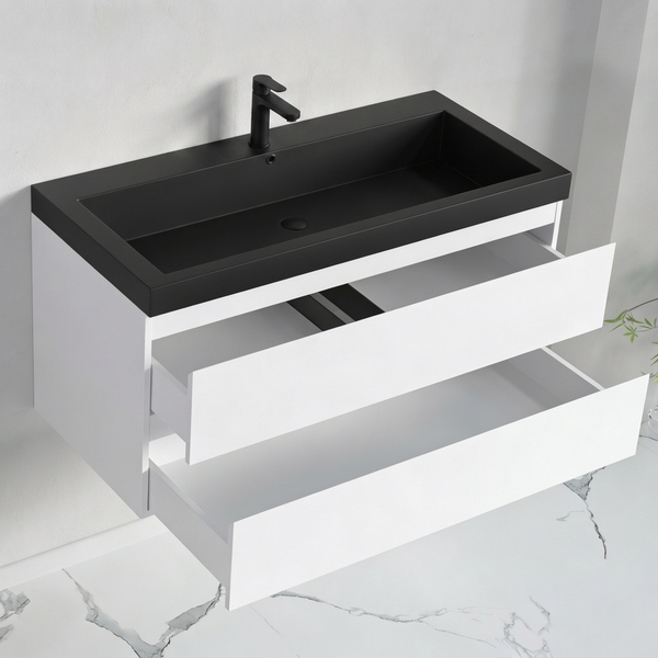 Wandhängender Waschplatz mit zwei Schubladen und einem Aufsatzwaschbecken inklusive Armatur für ein modernes Badezimmer.