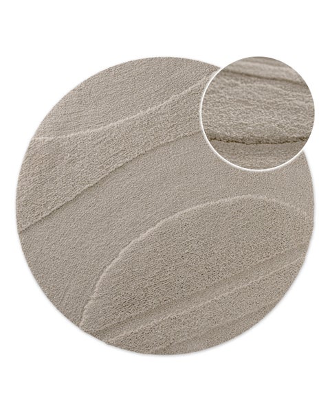 Runder Teppich in Beige mit Wellenstruktur und Detailansicht der Oberflächentextur.
