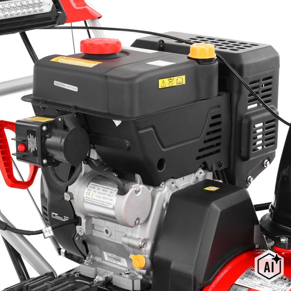 Motor einer Hecht Schneefräse mit Tankdeckel, Motorblock und Bedienungselementen für den Wintereinsatz