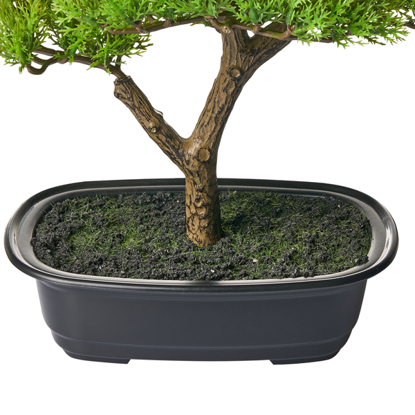 Künstlicher Bonsai Baum im schwarzen Topf