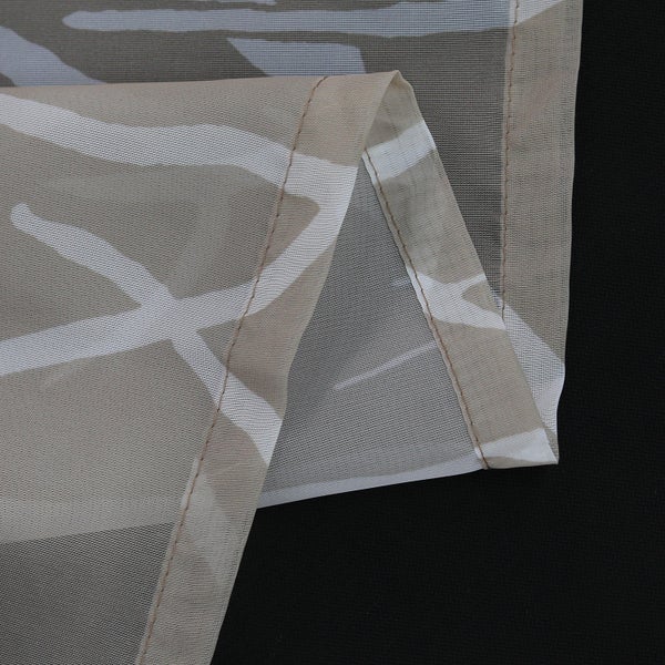 Detailansicht eines Dekostoffs mit geometrischem Muster.