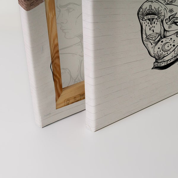 Detailansicht von zwei Leinwandbildern mit Tattoo-Motiven und Holzrahmen