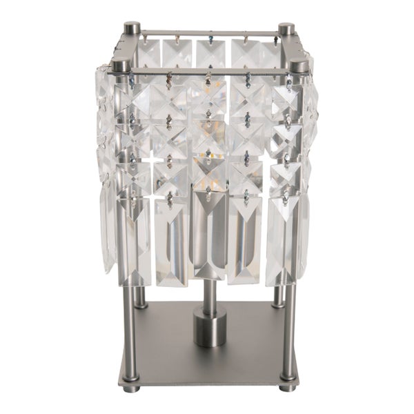 Tischleuchte mit Kristallbehang und Metallelementen.