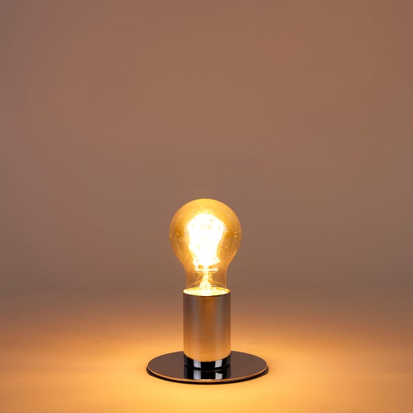 Tischleuchte mit Metallsockel und Glühbirne
