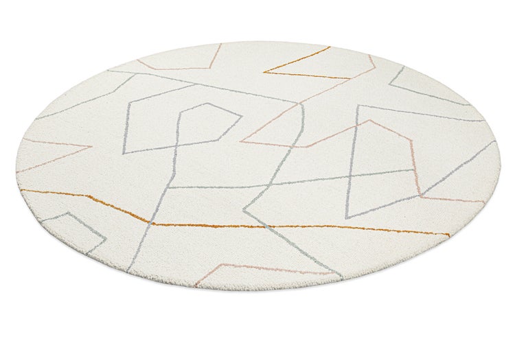 Runder Teppich mit modernem geometrischem Linienmuster und weicher Oberfläche.