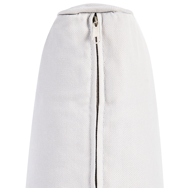 Detailaufnahme eines hellen Kissens mit Reißverschluss