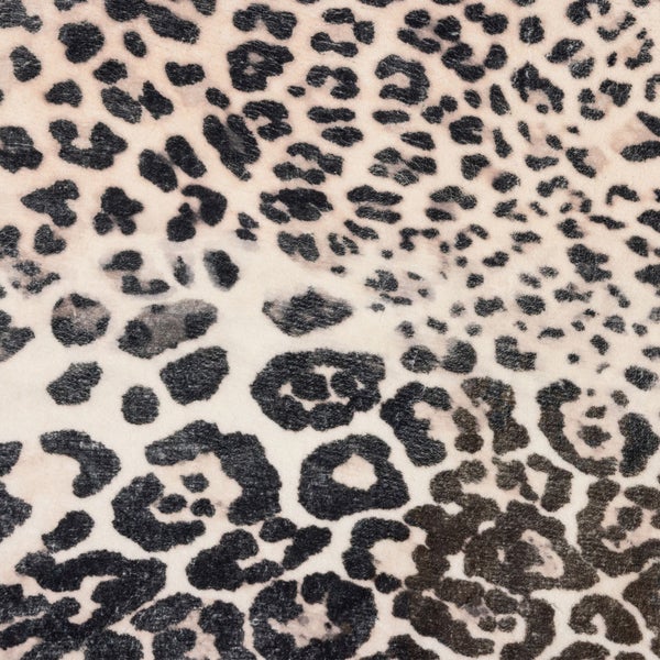 Tapete mit Leopardenmuster und strukturierter Oberfläche in Tierfell-Optik.