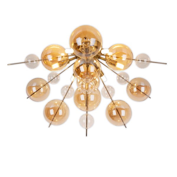 Dekorative Wandleuchte mit einem roten, tropfenförmigen Glas in der Mitte eines gerippten, blattförmigen Metalls