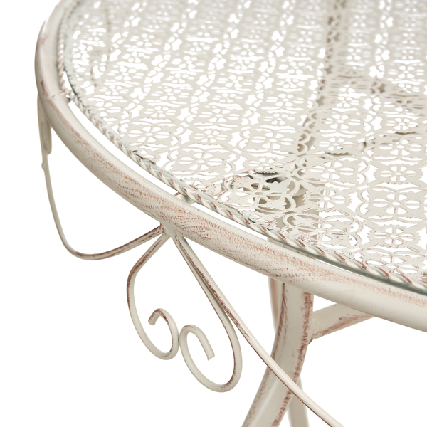 Detailansicht eines Gartentisches mit Glasplatte und Metallgestell