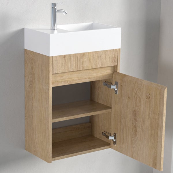 Waschplatz mit hängendem Waschtischunterschrank in Holzoptik und integriertem Waschbecken inklusive Armatur.