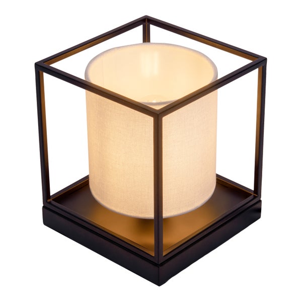 Tischleuchte mit Stoffschirm in einem dunklen Rahmen