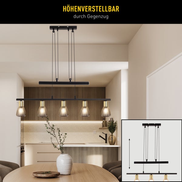 Höhenverstellbare Pendelleuchte mit fünf Lampen über einem Esstisch in einem modern eingerichteten Raum.