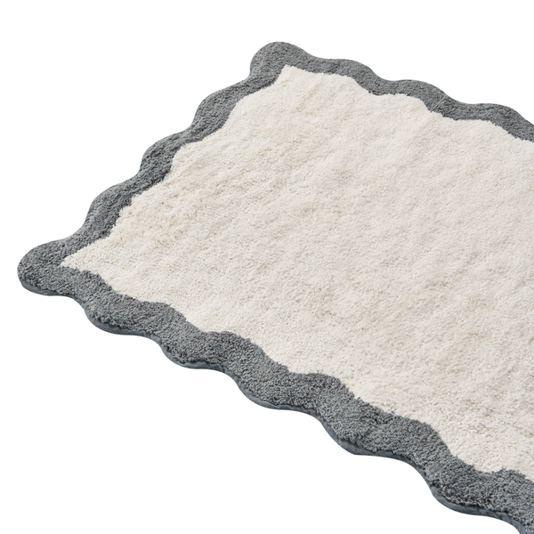 Badezimmerteppich mit gewelltem Rand