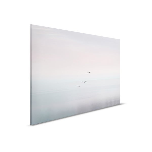 Leinwandbild mit einer Szene von fliegenden Vögeln über dem Meer