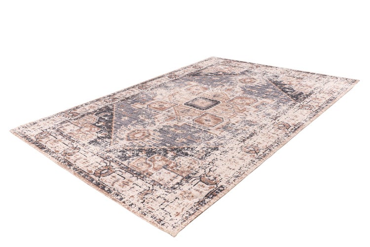 Rechteckiger Teppich mit orientalischem Vintage-Muster und Used-Look.