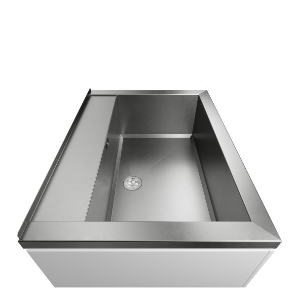 Spülbecken aus Edelstahl mit Abtropffläche auf einem weißen Unterschrank