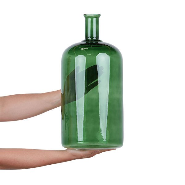 Detailaufnahme eines grünen Glasgefäßes.