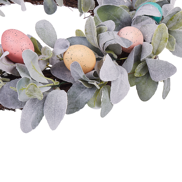 Dekorativer Osterkranz mit Eiern und Pflanzen