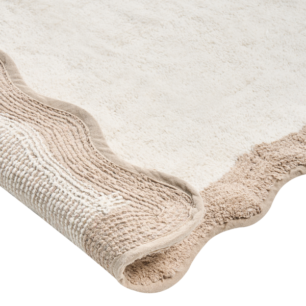 Beige Badematte mit gewelltem Rand