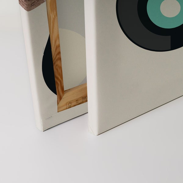 Zwei Leinwandbilder mit abstrakten Kreisformen und Holzrahmen.