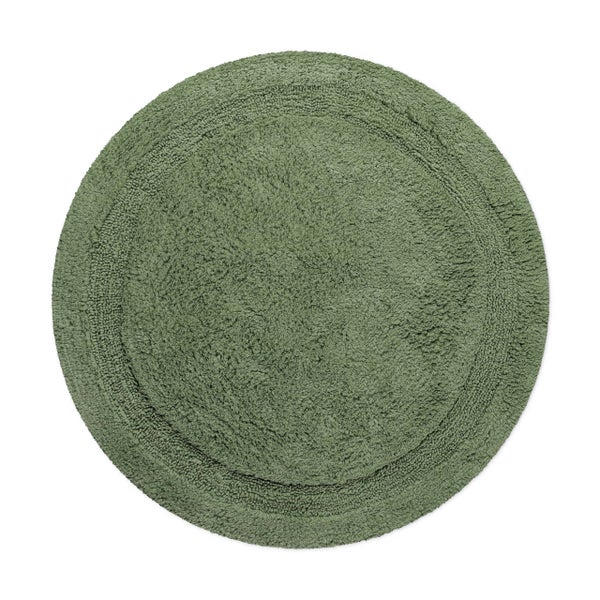 Runde grüne Badematte aus weichem Material mit konzentrischen Kreisen