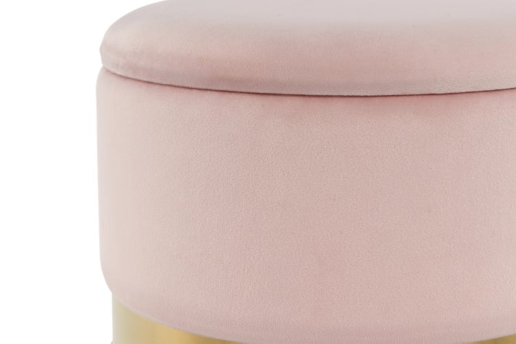 Zwei rosafarbene, zylinderförmige Hocker mit Stauraum vor einem Bett in einem Schlafzimmer.