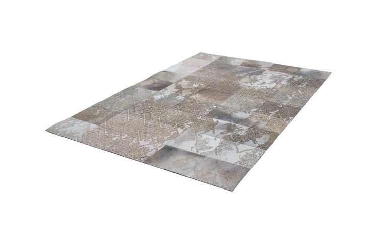 Patchwork-Teppich mit Ornament-Muster.