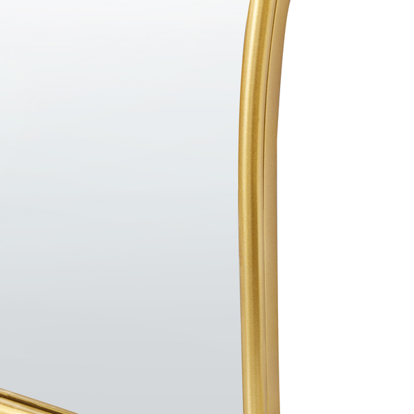 Detailaufnahme eines Spiegels mit goldfarbenem Rahmen