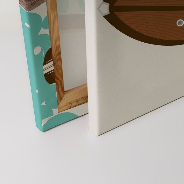 Nahaufnahme zweier Leinwandbilder mit unterschiedlichen Motiven und Holzrahmen