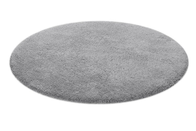 Runder brauner Badeteppich mit geometrischem Hoch-Tief-Muster aus weichem Material, Detailansicht der Struktur.