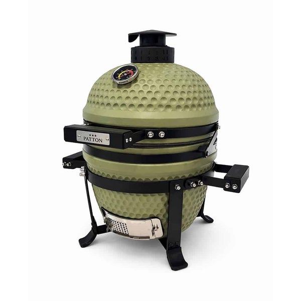 Grüner Patton Kamado-Keramikgrill mit Thermometer, Belüftungskappe, seitlichen Griffen und schwarzem Metallgestell.