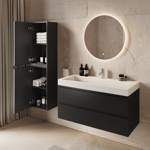 Helles, modernes Badezimmer mit wandhängendem anthrazitfarbenem Waschtischunterschrank, zwei Schubladen und weißem Waschbecken vor Steinwänden.