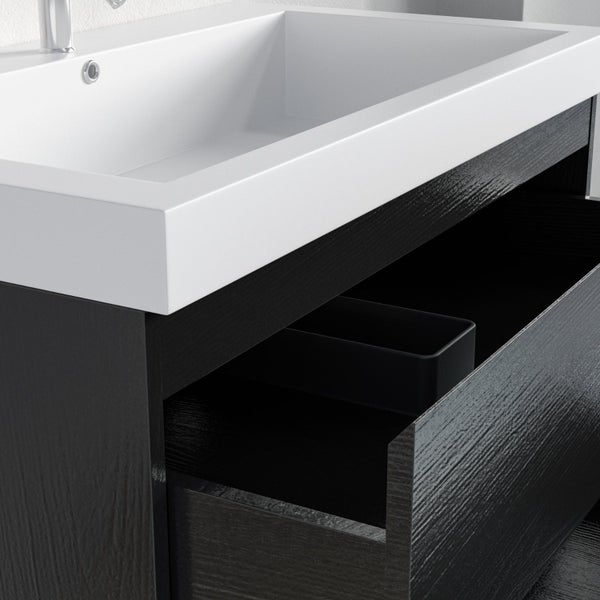 Moderner Badunterschrank mit integriertem Waschbecken und geöffneter Schublade mit Holzstruktur.
