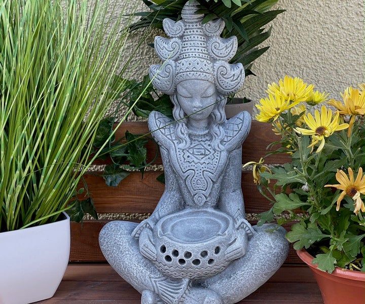 Dekorative Gartenfigur im asiatischen Stil als sitzende Buddha Figur mit Schale für den Außenbereich