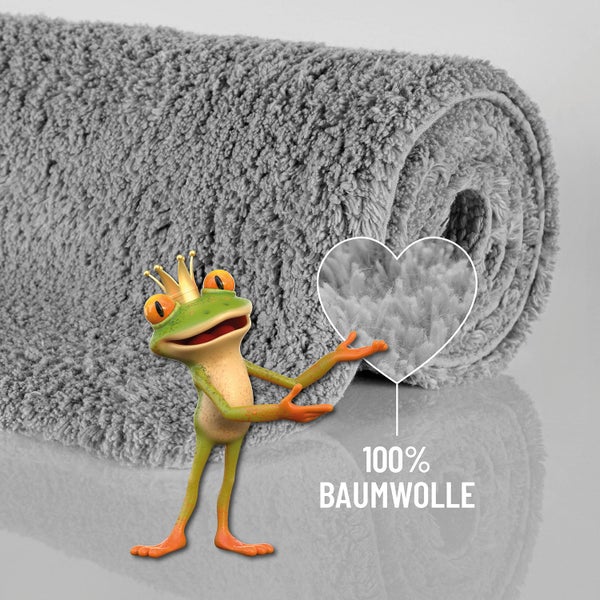 Badematte aus 100 Prozent Baumwolle mit weicher, flauschiger Textur, gerollt.