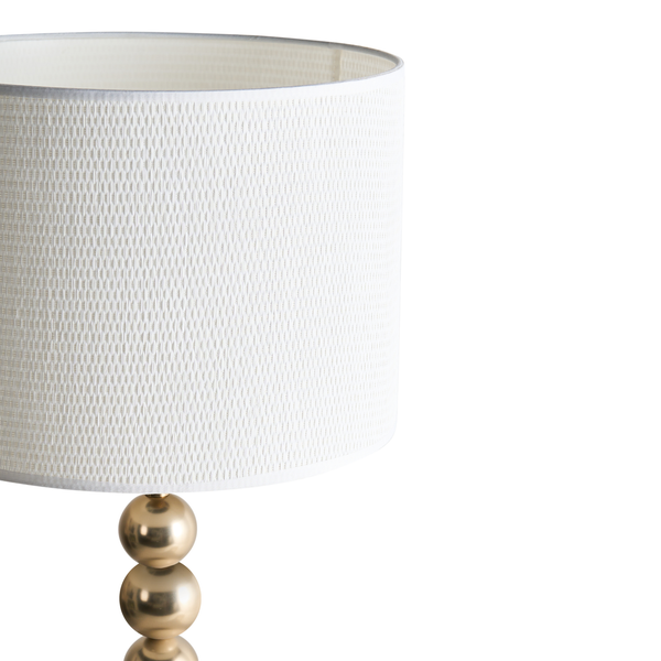 Tischleuchte mit Stoffschirm und goldenem Kugelfuß
