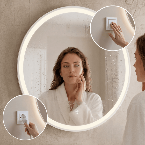 Runder LED Badezimmerspiegel mit integrierter Beleuchtung, Touch Schalter und Steckdosenanschluss in einer modernen Badezimmerumgebung.