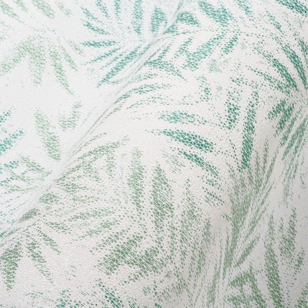 Nahaufnahme einer weißen Tapete mit Palmenblattmuster